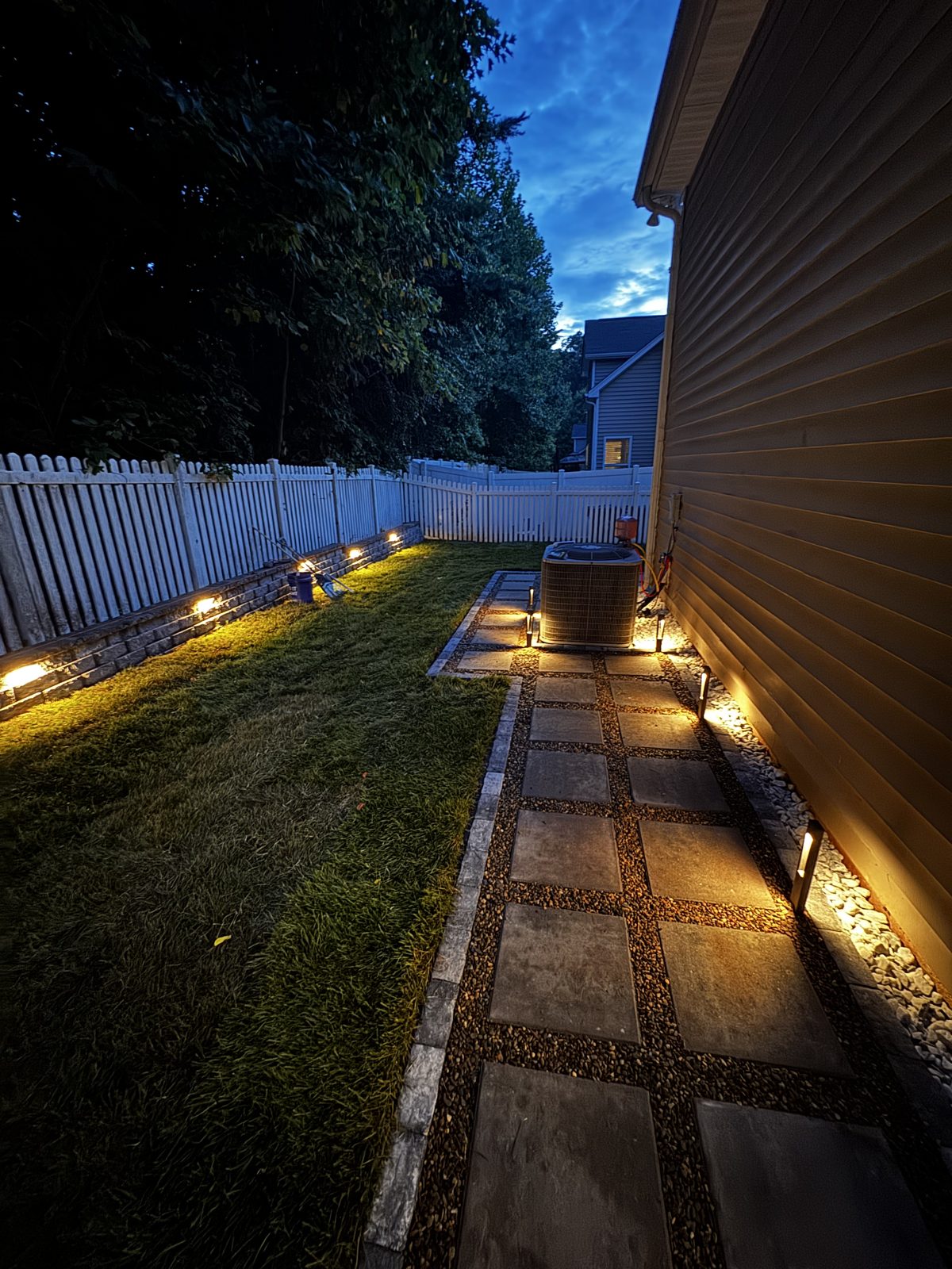 Finished backyard lit at night